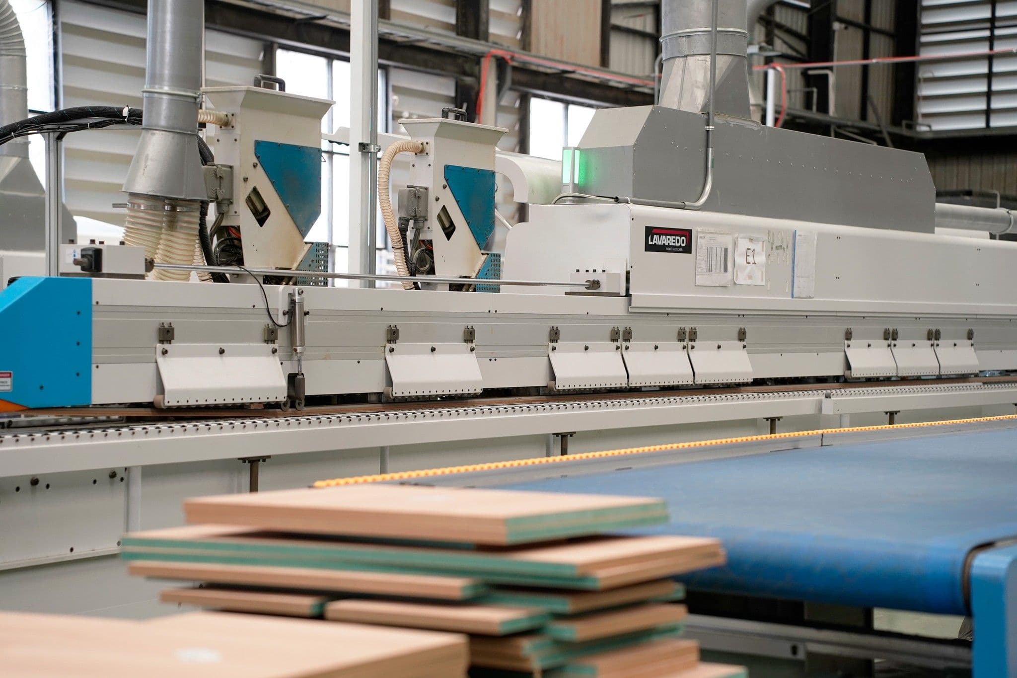 Cabinet panels and production machinery inside the Lavaredo factory